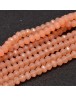 Stiklo karoliukai, apvalūs, plokšti, briaunuoti, šviesiai oranžinė, matmenys: 6x4mm; skylė: 1.0mm; apie 99 vnt./gijoje