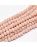 Stiklo karoliukai, apvalūs, plokšti, briaunuoti, kreminiai, matmenys: 4x3mm; skylė: 1.0mm; apie 149 vnt./gijoje