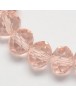 Stiklo karoliukai, apvalūs, plokšti, briaunuoti, skaidrūs, rausvi, matmenys: 12x8mm; skylė: 1.0mm; apie 72 vnt./gijoje